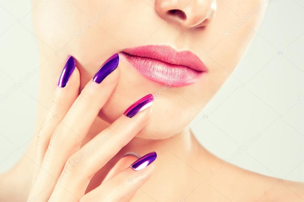 Beautiful purple nails and soft lips