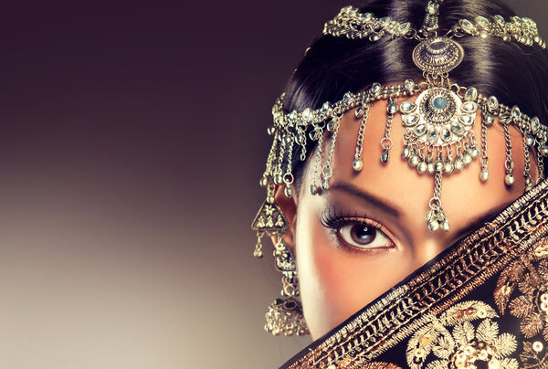 Indian woman portrait with jewelry .