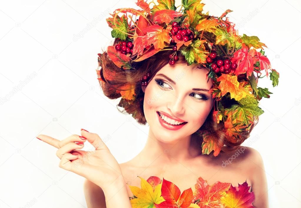 Girl with autumn wreath of leaves — Stock Photo © EdwardDerule #83476032