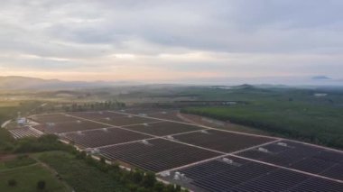 Aerial view of Hyperlapse Time lapse Solar cell farm, Solar power plants have clouds moving through and sunlight shines. footage video 4k.