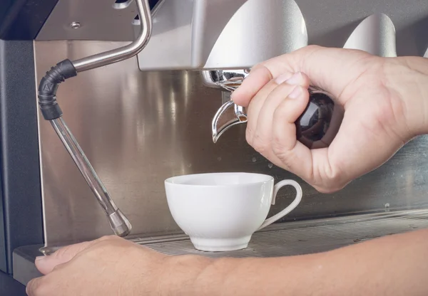 Barista hand with espresso coffee machine — Stock Photo, Image