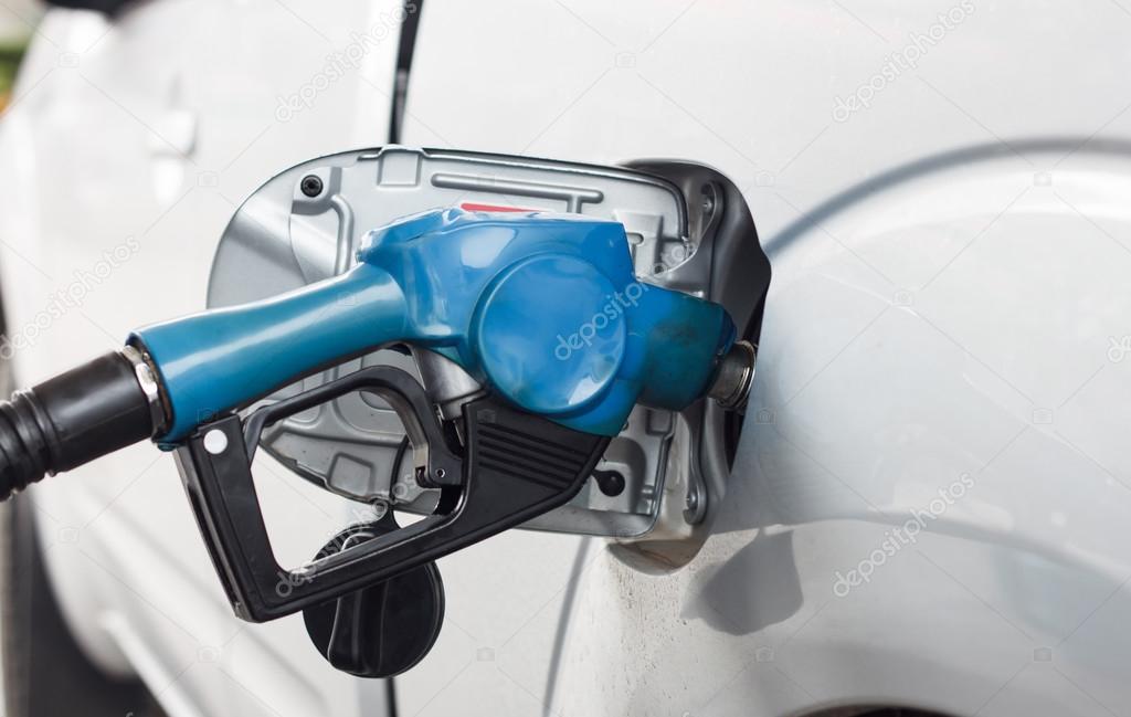 Close up scene of gasoline car refilling