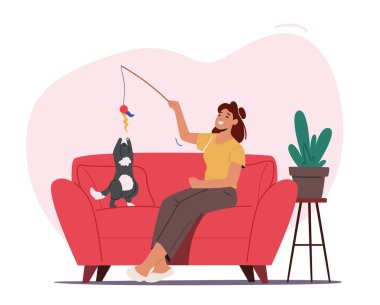 Sevgi, Hayvanların Bakımı, Kadın ve Hayvan Konsepti. Kadın ve Kedi Oyuncak Oturma Odasında Otururken Oynuyor