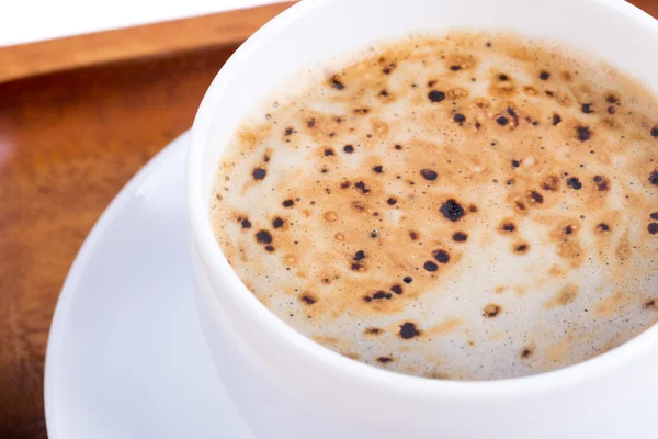 Xícara de café em uma madeira — Fotografia de Stock