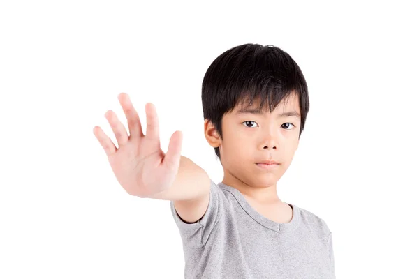 Porträt eines kleinen Jungen macht Stop-Geste auf weißem Hintergrund — Stockfoto
