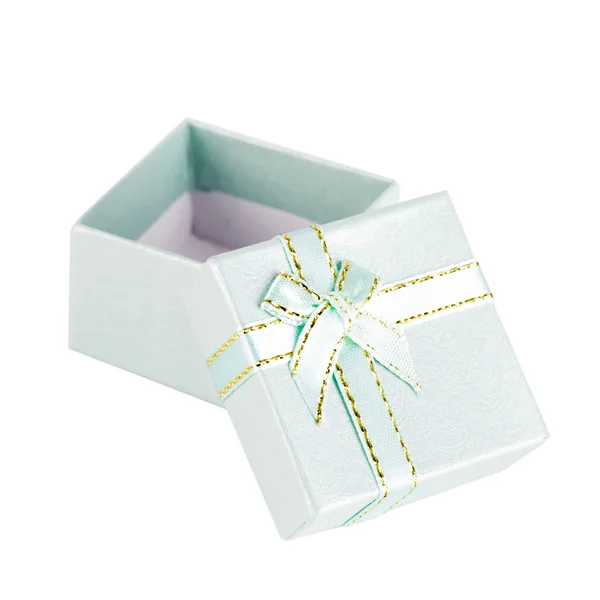 A green gift with a ribbon and a bow — Stock Photo, Image