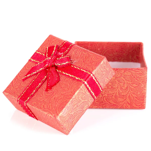 Red gift box with ribbon bow isolated on white — Stock Photo, Image