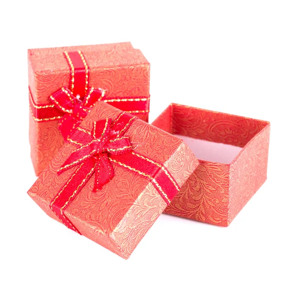 Red gift box with ribbon bow isolated on white — Stock Photo, Image