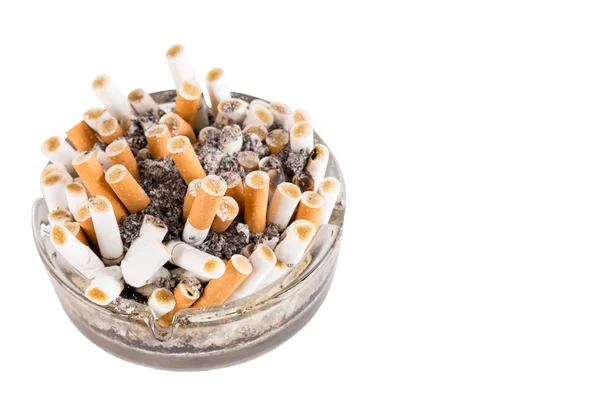 A dirty ashtray with cigarette ash and butts — Stock Photo, Image