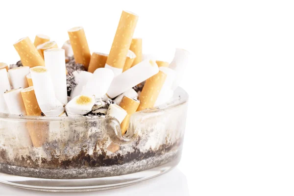 A dirty ashtray with cigarette ash and butts — Stock Photo, Image