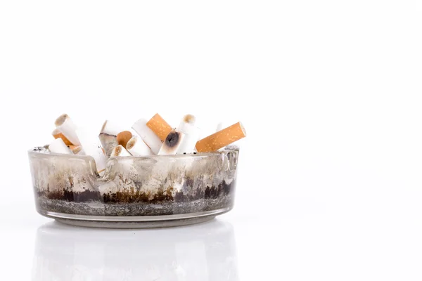 Ashtray and cigarettes on white background — Stock Photo, Image