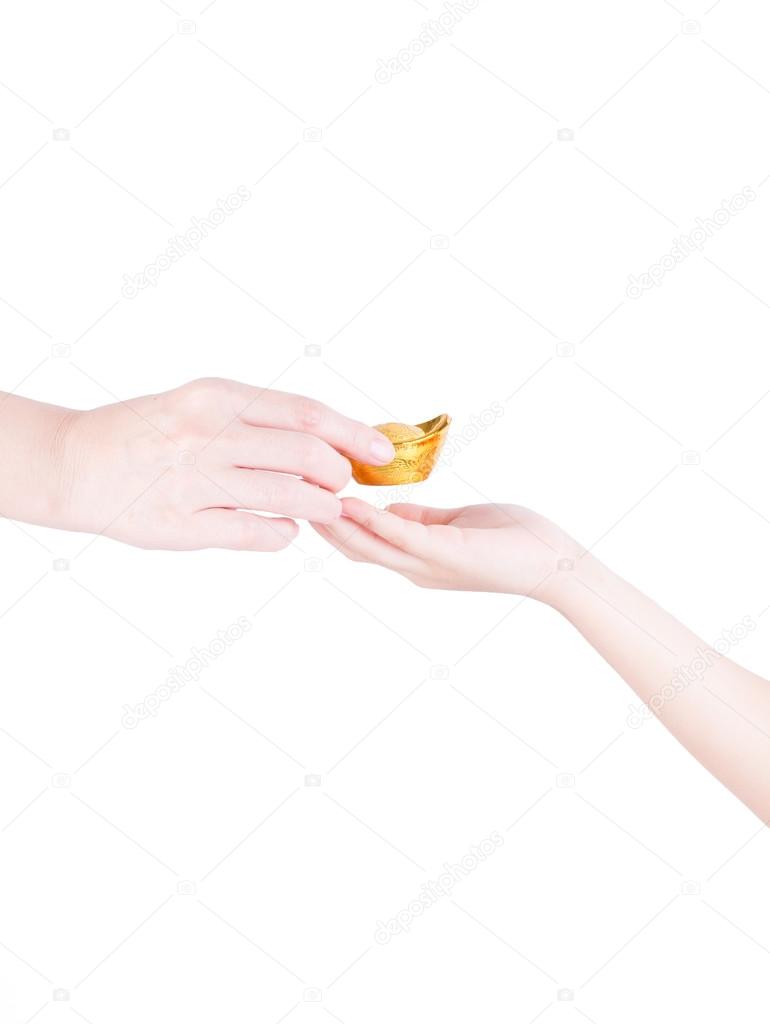 Adult's Hand Giving A Chinese Gold Isolated On White Background