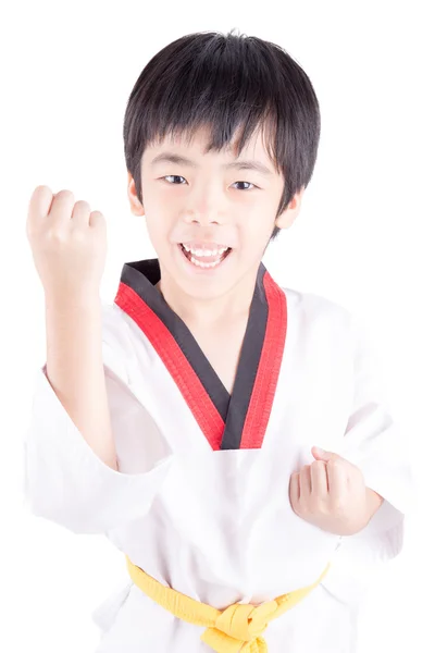 Мальчик в костюме тхэквондо на белом фоне — стоковое фото
