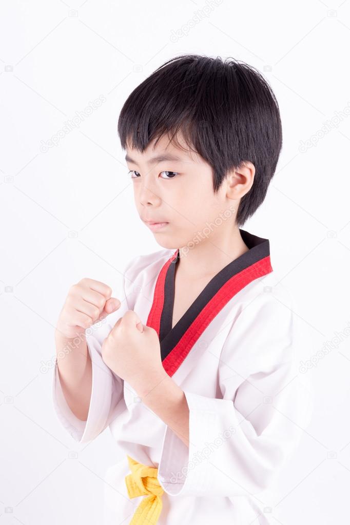 little boy in a Taekwondo suit