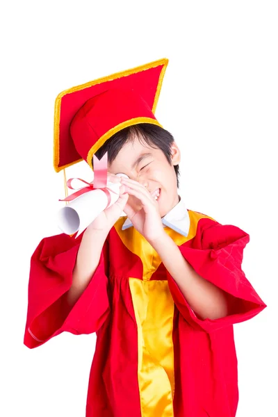 Söt liten pojke klädd i röd klänning Kid examen med Mortarboard — Stockfoto