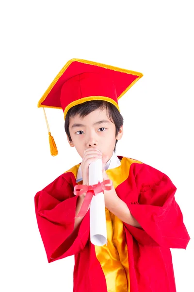 Söt liten pojke klädd i röd klänning Kid examen med Mortarboard — Stockfoto