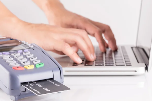 Payment with a credit card through terminal — Stock Photo, Image