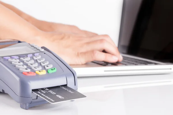 Payment with a credit card through terminal — Stock Photo, Image