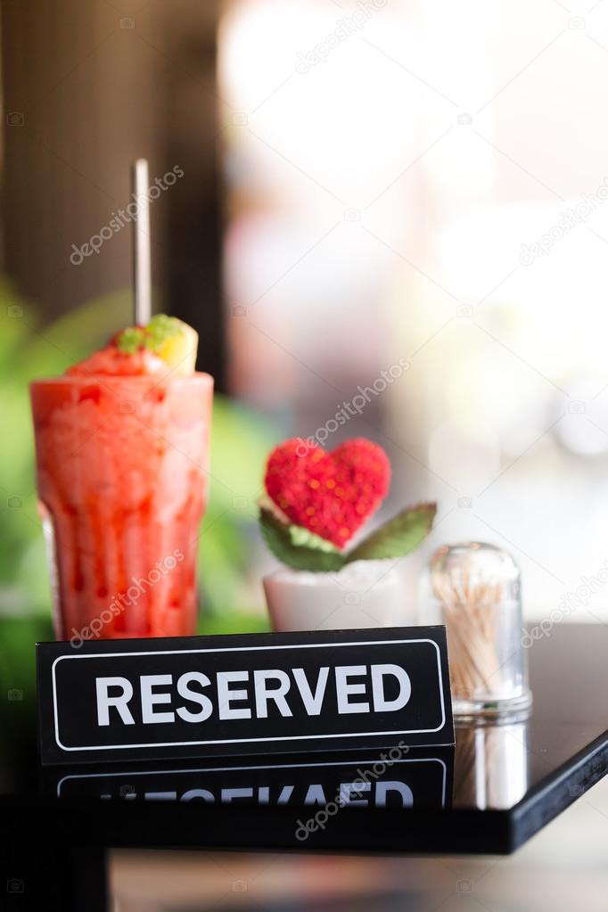 Vintage Styled Image Of A Reserved Sign On A Table In Restaurant