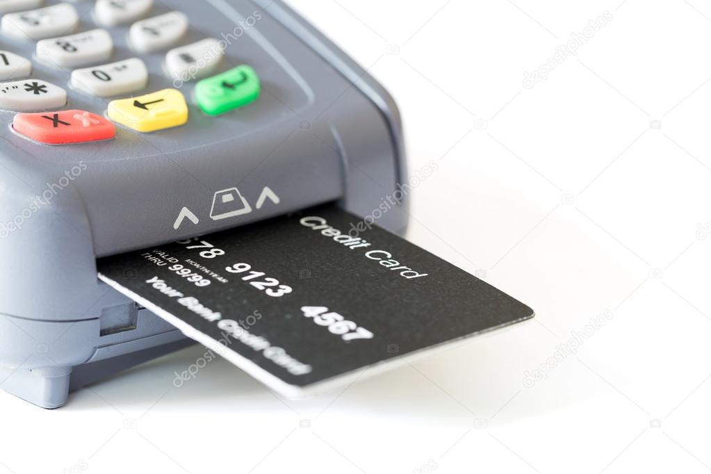 Credit card and card reader on white background with copyspace