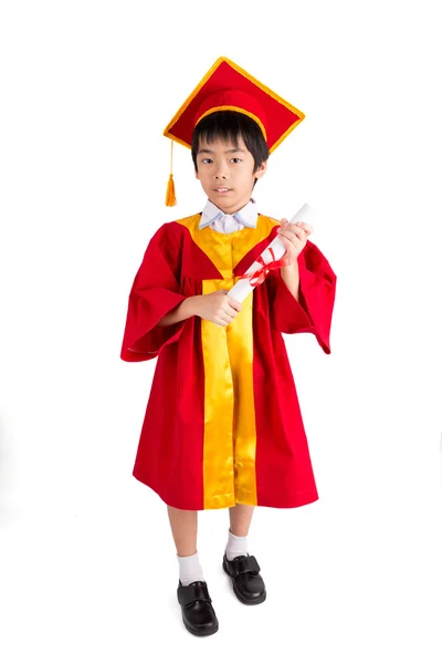 Roztomilý malý chlapec nosí červené šaty maturitní Kid s hlavě — Stock fotografie