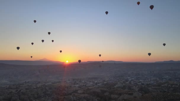 Cappadocia, Turkey : Balloons in the sky. Aerial view — Stock Video