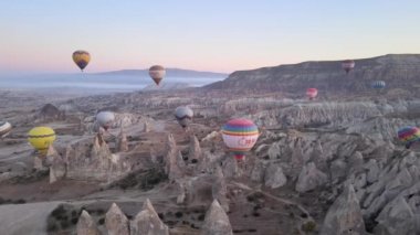 Cappadocia, Turkey : Balloons in the sky. Aerial view