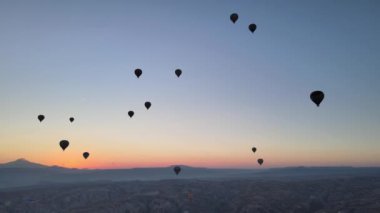 Cappadocia, Turkey : Balloons in the sky. Aerial view