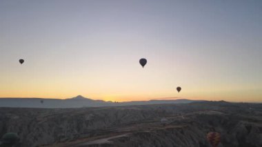 Cappadocia, Turkey : Balloons in the sky. Aerial view