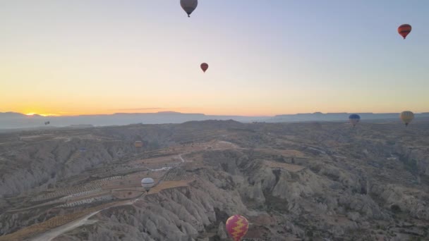 Cappadocia, Turkey : Balloons in the sky. Aerial view — Stock Video