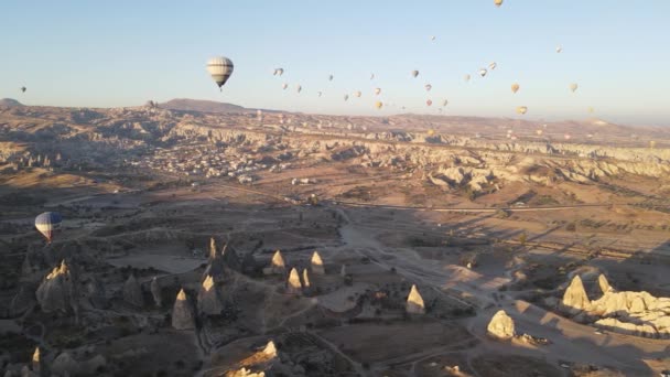 Cappadocia, Turkey : Balloons in the sky. Aerial view — Stock Video