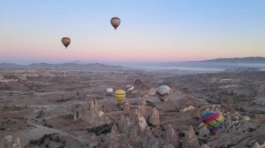 Cappadocia, Turkey : Balloons in the sky. Aerial view