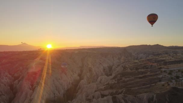 Cappadocia, Turkey : Balloons in the sky. Aerial view — Stock Video