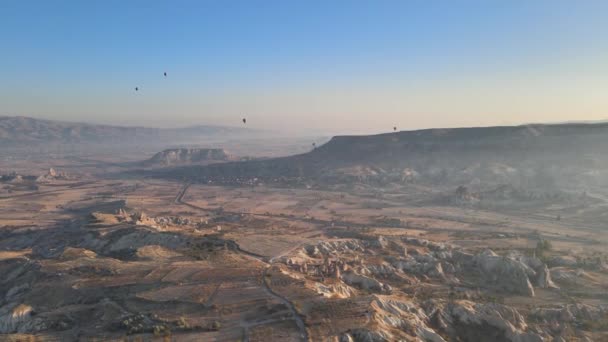 Cappadocia, Turkey : Balloons in the sky. Aerial view — Stock Video