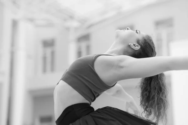 Black and white photo of flexible slender young girl ballerina. BW — Photo