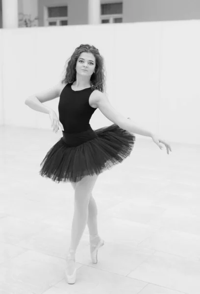 Black and white photo of flexible slender young girl ballerina. BW — Stok fotoğraf