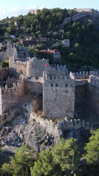 Vertical video Alanya Castle - Alanya Kalesi aerial view. Turkey — Stock Video