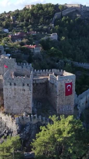 Vertical video Alanya Castle - Alanya Kalesi aerial view. Turkey — Stock Video