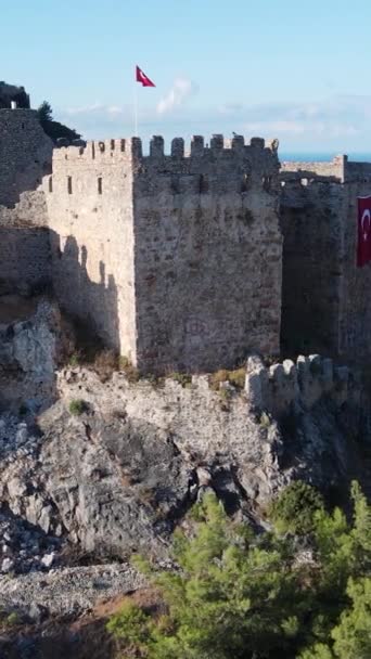 Vertical video Alanya Castle - Alanya Kalesi aerial view. Turkey — Stock Video