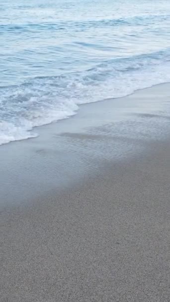 Sea near the coast - close-up aerial view of the coastal seascape. Vertical video — Stock Video