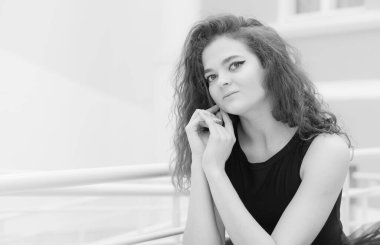 Black and white photo of flexible slender young girl ballerina. BW