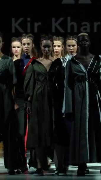Group of models walking on the catwalk Vertical video — Stock Video