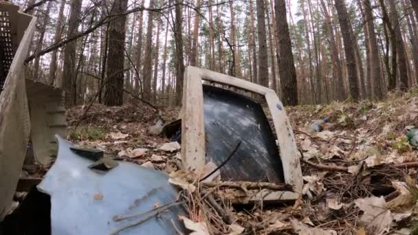 Old computer in a junkyard in the forest, slow motion — Stock Video