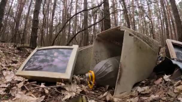 Computer in a junkyard in the forest — Stock Video