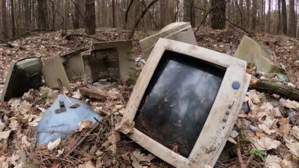 Computer in a junkyard in the forest — Stock Video