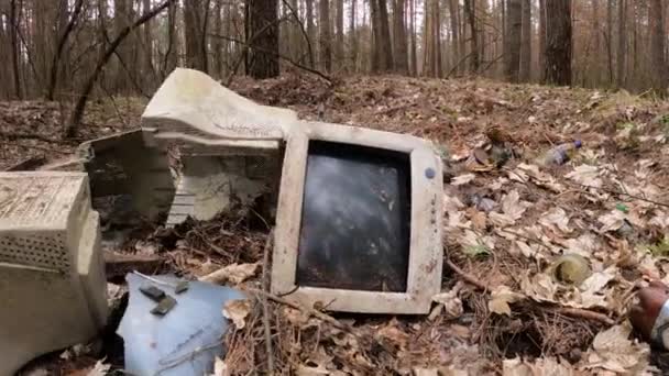 Computer in a junkyard in the forest — Wideo stockowe