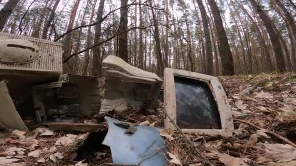 Computer in a junkyard in the forest — Stock Video