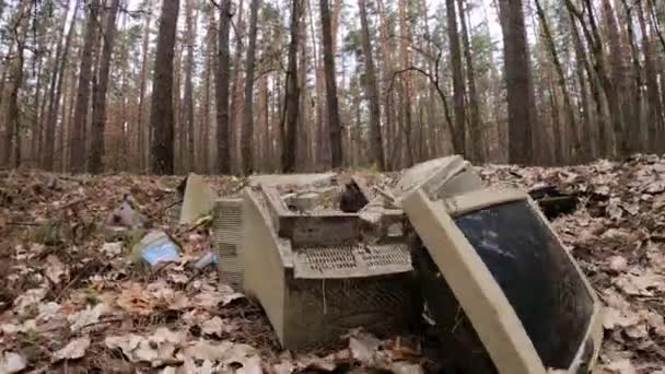 Computer in a junkyard in the forest — Stock Video