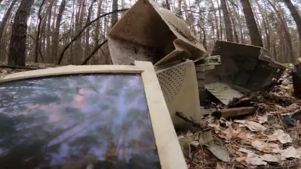 Computer in a junkyard in the forest — Stock Video