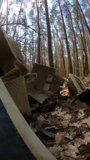 Vertical video of the computer in a junkyard in the forest, slow motion — Stock Video